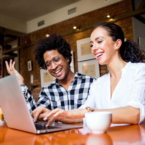 Couple having a business meeting at a cafe